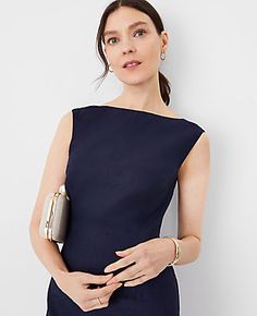 Elevate your wardrobe with the Ann Taylor Petite Linen Blend Boatneck Sheath Dress, a testament to timeless elegance and comfort. This dress, tailored specifically for petite frames, features a sophisticated boatneck and a sleek sleeveless design, making it a perfect choice for both professional settings and social gatherings.

- Size: Petite 00
- Color: Night Sky
- Material: Shell - 54% Linen, 29% Polyester, 15% Viscose, 2% Spandex; Lining - 100% Cotton
- Gender: Female
- Features: Front slit, Brown Sheath Dress, Sheath Dress Styling, Timeless Cocktail Dresses, Navy Blue Sheath Dress, Work Formal Dress, Cocktail Dress Over 40 Classy, Smart Attire For Women, Business Cocktail Dress, Black Sheath Dress Outfit