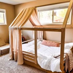 A charming house-shaped bed crafted entirely from natural wood Queen Montessori Bed, Montessori Bed Queen Size, Monisorri Toddler Beds, Queen Sized Montessori Bed, Montessori Playroom Beds & Bed Frames, Wood House Toddler Bed, Diy Kids Bed, Twin House Bed, Violet Room