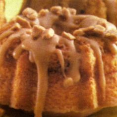 a cake with icing sitting on top of a plate