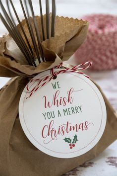 we wish you a merry christmas gift wrapped in brown paper and tied with twine