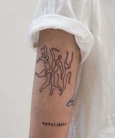 a person with a tattoo on their arm