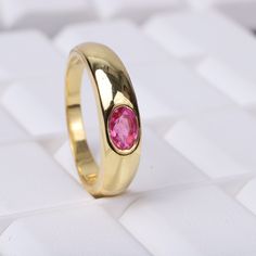 Vintage Ruby Wide Band Ring, Wedding Ring, 14k Solid Gold, Christmas Gift, Unisex Ring, July Birthstone, Promise Ring, New Year Jewelry Ring Description:- Main Stone- Ruby Cut of Stones - Faceted Stone size - 4x6 mm Stone Color- Pink Stone Shape - Oval Creation- Lab Created Birthstone - July Stone Grade - AAA+ Check out my other items! PAYMENTS We accept PayPal, If we do not receive payments immediately we will hold the item only for one working day for your payments and we will be re-listing th Gold Ruby Wedding Ring 14k, Ruby Open Ring With Bezel Setting For Wedding, Vvs Clarity Oval Ruby Ring For Wedding, Oval Ruby Ring With Vvs Clarity For Wedding, Ruby Wedding Ring With Bezel Setting, Gold Ruby Ring In 14k For Wedding, Gold Ruby Ring With Round Band For Anniversary, Gold Ruby Ring With Center Stone In Round Band, 14k Gold Ruby Ring With Bezel Setting For Wedding