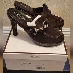 Coach Size 7 Coach Slip-on Heels For Spring, Chic Slip-on Coach Heels, Coach Slip-on Mules, Coach Casual Closed Toe Heels, Chic Coach Slip-on Heels, Casual Coach Closed Toe Heels, Classic Coach Heels For Spring, Casual Closed Toe Coach Heels, Casual Brown Coach Heels