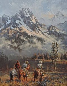 two men riding horses in front of a mountain range with snow on the mountains behind them