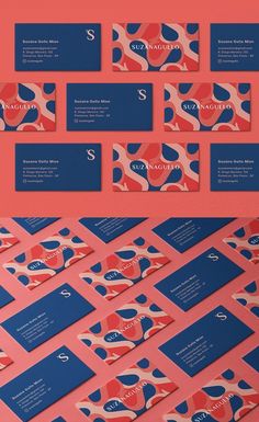 business card mockup with red and blue shapes on it, including the letter s