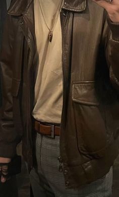 Brown Aesthetic Fashion Men, Brown Jacket Outfit Men Aesthetic, Men’s Brown Jacket Outfit, Dark Acedima Aesthetic Outfits Men, Male Aethestic Outfit, Soft Grunge Mens Fashion, Dark Acedamia Outfit Ideas Men, Mens Brown Leather Jacket Outfit, Adventure Core Outfits Men