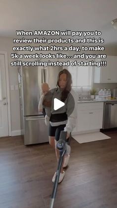 a woman is using an amazon vacuum to clean her kitchen