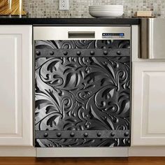 a dishwasher sitting on top of a kitchen counter