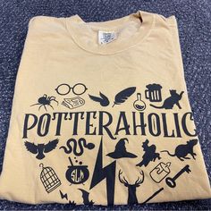 Harry Potter Potteraholic Comfort Colors T-Shirt New Without Tags- It Was Gifted To Me And Did Not Fit Size Large Harry Potter Signs, Harry Potter Tee, Universal Shirts, Harry Potter Shirts, Comfort Colors Tshirt, Yellow Black, Black N Yellow, Tshirt Colors, Comfort Colors