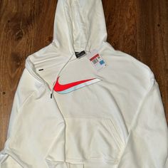 White Nike Hoodie- Orange Swoosh White Casual Hoodie Top, Casual White Hoodie Top, White Sports Hoodie, Trendy White Hoodie Top, Casual White Fleece Sweatshirt, Nike Casual Hoodie With Graphic Print, Casual Nike Hoodie With Graphic Print, White Crew Neck Sweatshirt With Drawstring Hood, White Hooded Sports Top