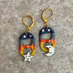 Love you to the moon and back! Enjoy your starry nights with these hand painted earrings featuring cute star and moon charms and lever back closures. You can see the optional matching bracelet here: https://www.etsy.com/listing/550839941/sun-and-moon-soda-pop-tab-bracelet-blue?ref=shop_home_active_22&sca=1 I use lever back closures on all my earrings because they close easily and are harder to accidentally lose. All items are handmade by me in my smoke free, pet friendly home, and available to s Tab Earrings, Soda Tab Crafts, Pop Tab Crafts, Soda Tabs, Can Tabs, Pop Tabs, Celestial Blue, Yellow Glitter, Funky Earrings