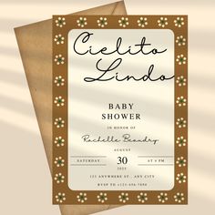 a brown and white baby shower card with the words celecit lindaa on it