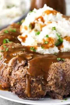 meatloaf with mashed potatoes and gravy on a plate