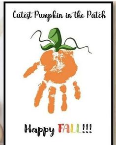 an orange handprint with the words happy fall