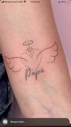 a small tattoo with the word pilipa on it and an angel above it