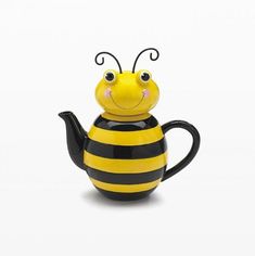 a yellow and black bee tea pot