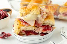 These Cranberry Turkey Sliders channel all of the fall vibes with warm bread, melty cheese, and bright cranberry sauce! Hawaiian Sweet Rolls, Deli Turkey