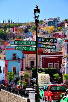 the street signs are clearly visible for all to see in this photo, and it's colorfully painted