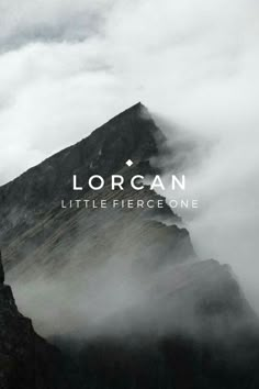 a mountain with the words lorgann above it and clouds in the sky behind it