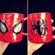 the spider man mug is being held up