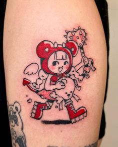 a person with a tattoo on their arm holding a baseball bat and wearing a bear costume