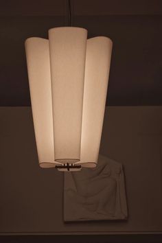 a light fixture hanging from the ceiling in a room