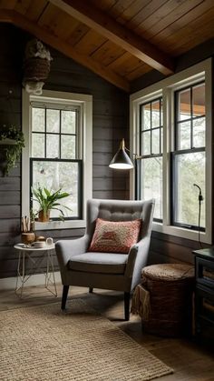 a living room filled with furniture and windows