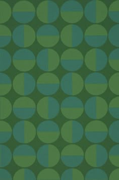 a green and blue wallpaper with circles on it