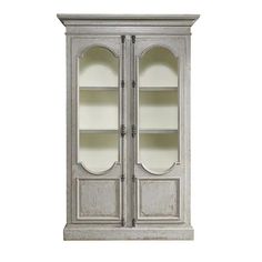 an old white bookcase with glass doors on the front and bottom shelves, isolated against a white background