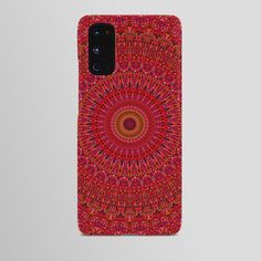 a red and orange phone case with an intricate design on the front, featuring a circular pattern