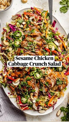 sesame chicken cabbage crunch salad on a white plate with the title sesame chicken cabbage crunch salad