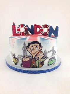 a cake decorated with cartoon characters and the word london