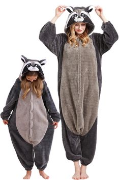 two people in animal onesuits with raccoon on the back and one wearing a