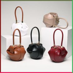 Chiko Frick Mini Handbag feature leather and clip opening on top. Measurement approx. M: 23*17*9.5 cm / S: 18*14*9 cm Modern Clutch Box Bag With Top Carry Handle, Office Bucket Box Bag With Handles, Modern Handheld Box Bag With Detachable Strap, Bucket Evening Bag With Handles, Chic Bucket Evening Bag With Handles, Formal Leather Bucket Evening Bag, Bucket Box Bag With Handles For Evening, Leather Shoulder Bag Clutch With Handles, Evening Bucket Box Bag With Handles