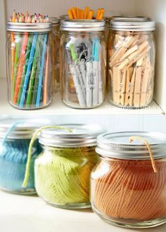 jars filled with yarn and crochet hooks