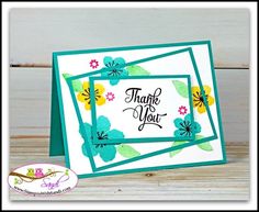 a thank you card with flowers on it