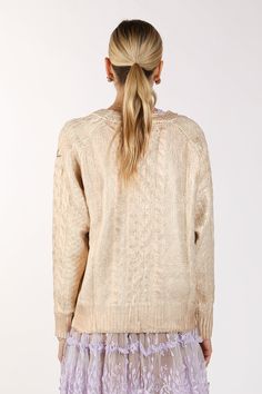 Metallic gold foil coated Low gauge knit Embellished gold button closure Ribbed knit cuffs and hems Raglan shoulder Regular fit Imported 100% ACRYLIC Model is 5' 10.5" Wearing a One Size Caring for your clothes is caring for the environmentWash your clothes with lower temperature and delicate spin cycles. It helps to maintain the color, shape and structure of the fabric. At the same time it reduces energy consumption that is used in care processes ONE SIZE MM4013_CHAMPAGNE_ALL Elegant Gold Sweater For Winter, Elegant Gold Winter Sweater, Gold Knit Sweater For Winter, Gold Knit Winter Sweater, Energy Consumption, Champagne Color, Spin Cycle, Knit Sweater Cardigan, Knit Cuff