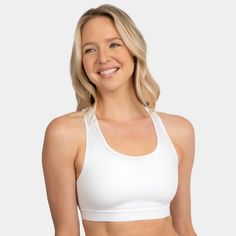 Introducing the Fruit of the Loom Medium Impact Wireless Sports Bra, the perfect addition to your workout wardrobe. This full coverage sports bra provides you with the necessary support and comfort during low to medium impact activities such as yoga, cycling, walking and lounging. Made with a non-padded design, this sport bra is perfect for those who prefer a natural look and feel. The smoothing racerback and wide comfort straps ensure that the bra stays in place while you move, allowing for a f Supportive Activewear With Built-in Padding For Light Sports, White Sports Bra With Built-in Padding, Workout Racerback Bra With Built-in Padding, White Yoga Sports Bra With Built-in Padding, Supportive Sports Bra With Built-in Padding For Light Sports, Supportive Sports Bra With Built-in Bra For Light Sports, Racerback Sports Bra With Built-in Padding For Light Exercise, White Sports Bra With Built-in Padding For Workout, Supportive Activewear With Built-in Bra For Light Sports