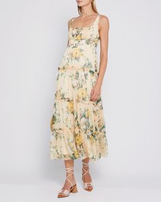 Price Comparison Few Moda $69 Alice + Oliva $595 Reformation $415 Product Details Tiers of dreamy chiffon create this ethereal gown. Done in one of our favorite prints with an effortlessly elegant flowy fit.- Lined- Elastic under bust- Content: 100% Polyester Style# T22WDR12397N Fit Notes - Model wearing a size XS - Mo Spring Wedding Tiered Chiffon Dress, Flowy Tiered Silk Maxi Dress, Flowy Silk Tiered Maxi Dress, Spring Midi Dress With Empire Waist And Lined Bodice, Flowy Floral Print Midi Dress With Empire Waist, Spring Silk Chiffon Maxi Dress With Floral Print, Sleeveless Chiffon Dress With Ruched Bodice For Spring, Spring Floral Print Silk Chiffon Maxi Dress, Ethereal Sleeveless Summer Dresses