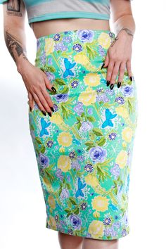 High Waisted Floral Dream Skirt Heavy Weight Stretch cotton twill floral dream print pencil skirt. Kick pleat, and stretch fused waist facing. Limited edition. Made in House to order. Model is wearing a size small. Spring Fitted Skirt For Garden Party, Green Fitted Printed Skirt, Fitted Green Printed Skirt, Spring Fitted Printed Skirt, Fitted Printed Skirt For Spring, Casual Fitted Skirt For Garden Party, Fitted Casual Skirt For Garden Party, Fitted Mini Skirt For Garden Party, Spring Floral Print Midi Pencil Skirt