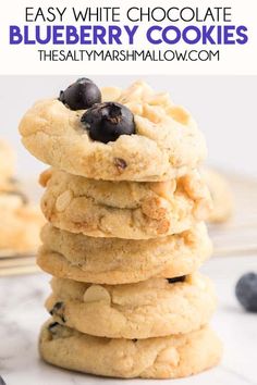 blueberry cookies stacked on top of each other with text overlay that reads easy white chocolate blueberry cookies