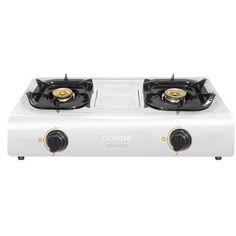 a white stove top with two burners on it