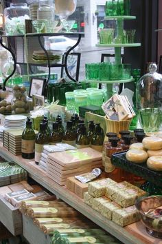 there are many different items on display in the store, including soaps and bottles