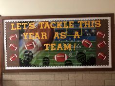 a sign on the wall that says let's tackle this year as a team