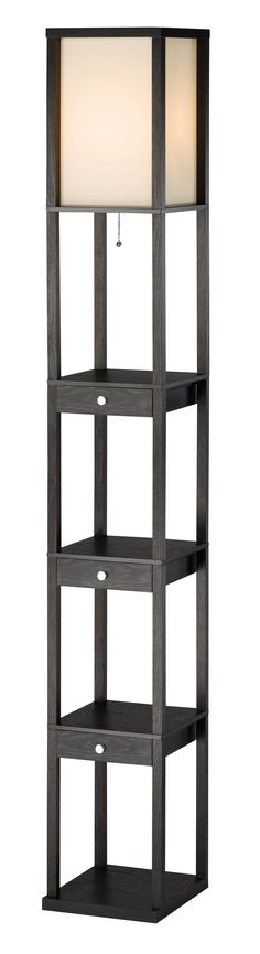 a tall black shelf with a lamp on it's top and two shelves below