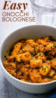 the cover of easy gnocchi bolognzose is shown in a white bowl