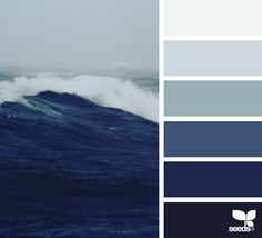 the ocean is full of blue and gray colors, with waves coming in from the water