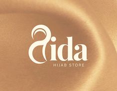 an image of a gold cloth with the word cida in white letters on it