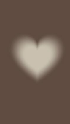 a white heart on a brown background