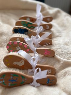 several wooden shoes are tied together with ribbons